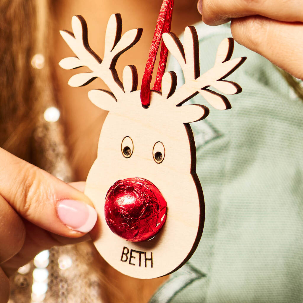 Reindeer Decoration And Bag Of Chocolate Noses